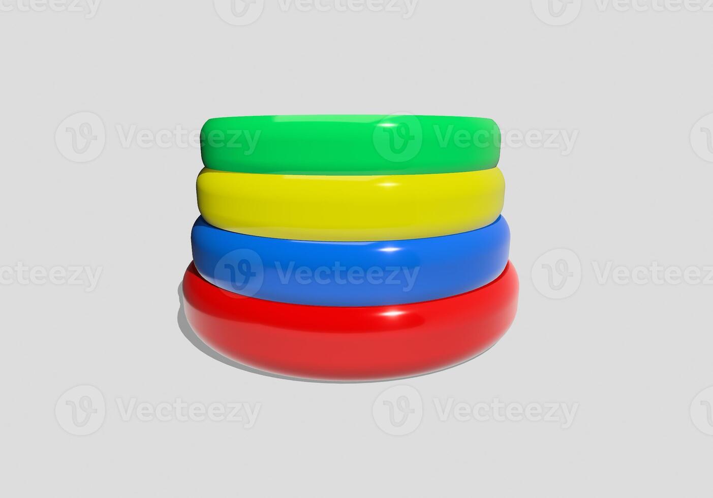A stack of colorful rings on a gray background photo