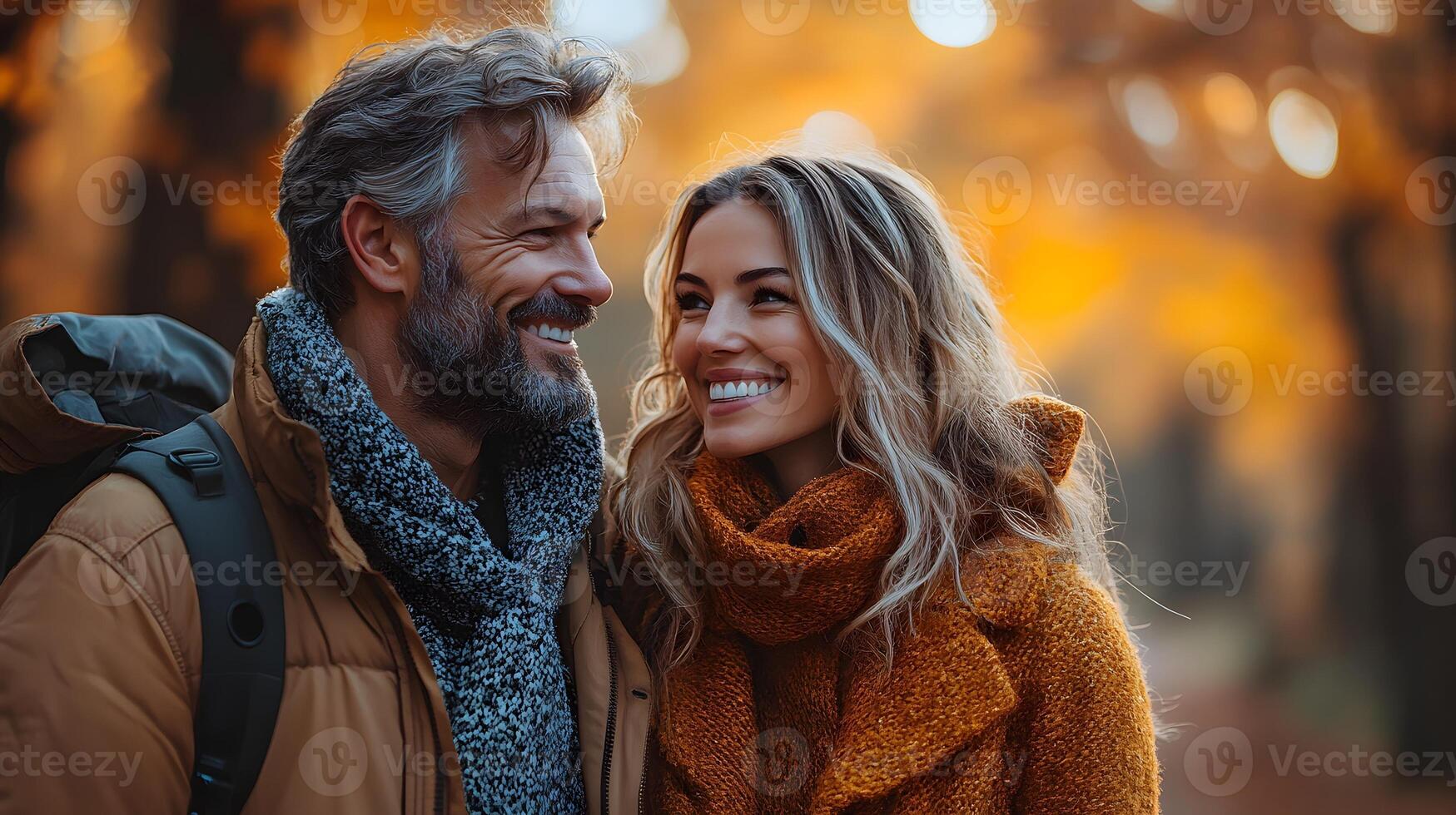 Smiling couple holding hands on a nature walk. photo