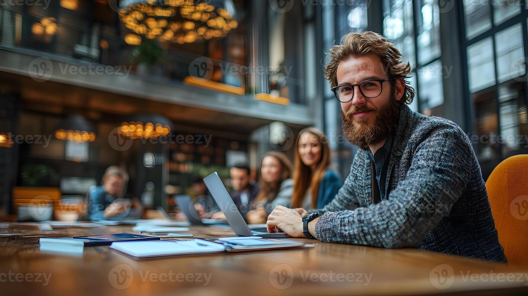 Business professionals collaborating using cloud-based customer management software photo