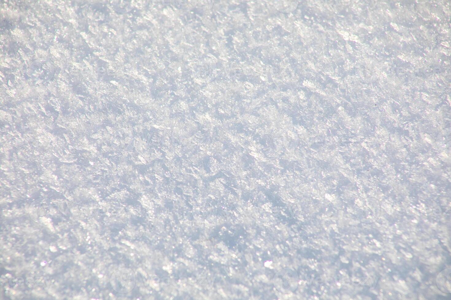 Sparkling white ice texture, winter wonderland, perfect for Christmas or New Years backgrounds, cold frost pattern photo