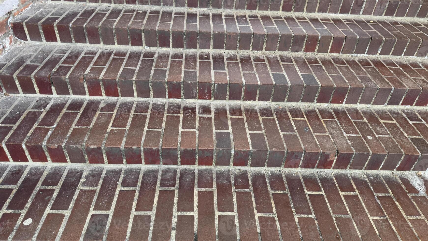 Brick steps leading upwards in urban setting, symbolizing progress, architecture and pathways photo