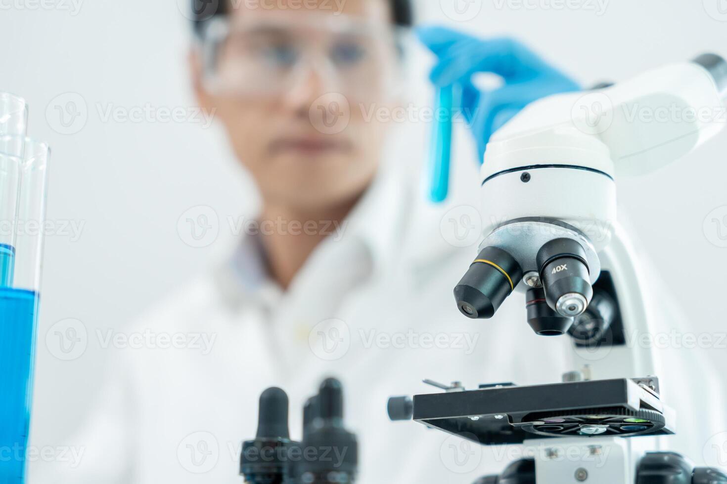 Scientist analyze biochemical sample in advanced scientific laboratory. Medical professional check chemical mix microbiological developmental of viral Biotechnology research in science lab photo