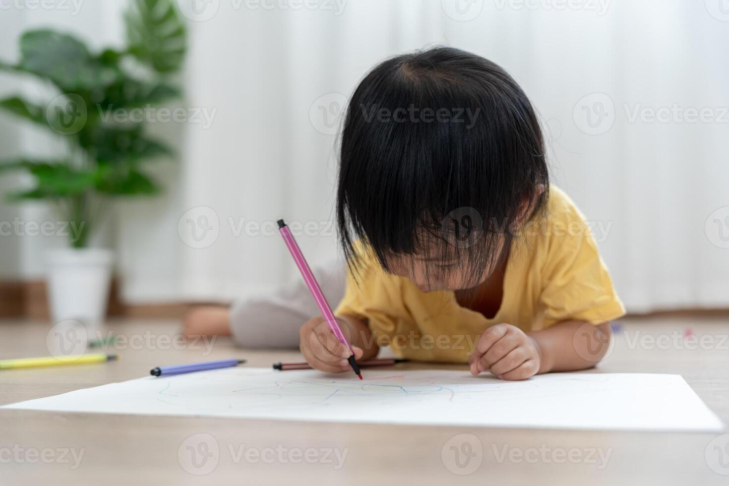 Happy Asia children learning and enjoy paint. family is happy and excited in the house. Mother and daughter having fun spending time together. Holiday, Activity, Executive Function IQ photo