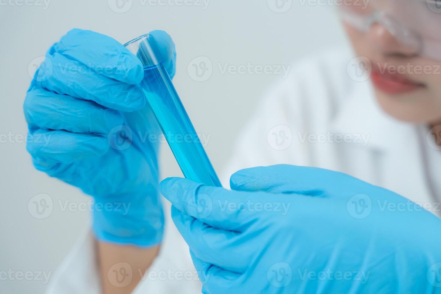 analyze biochemical sample in advanced scientific laboratory. Medical professional check chemical mix microbiological developmental of viral. Biotechnology research in science lab. cosmetic. photo