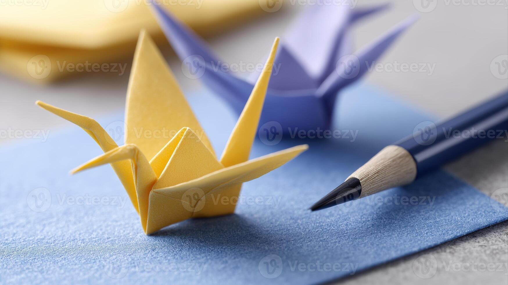Colorful Paper Cranes and Drawing Tool on a Craft Surface for Creative Projects photo