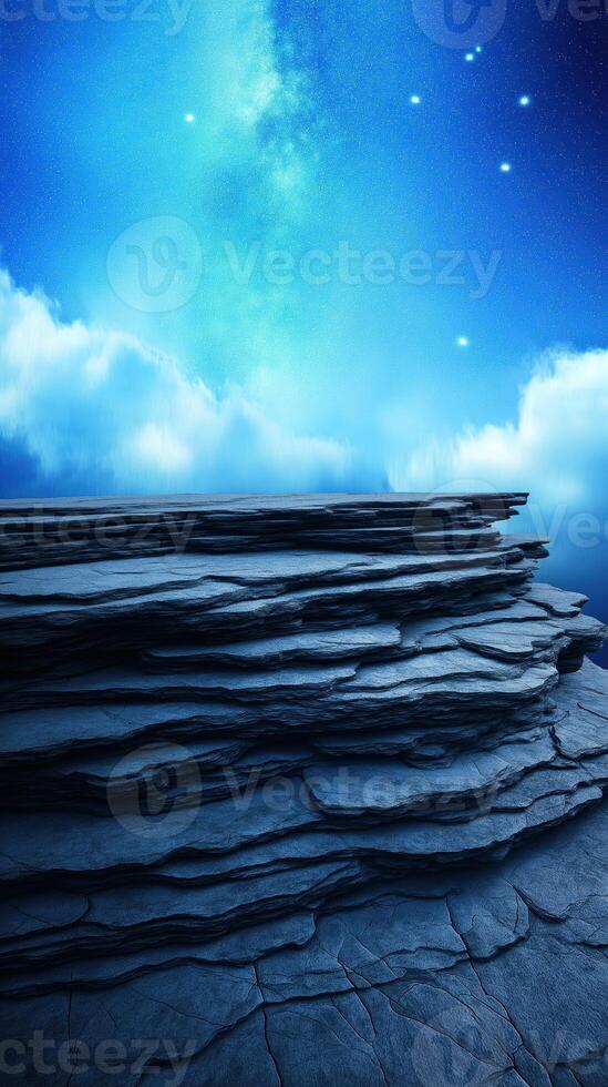 Glowing Rocky Coastline Under a Magical Starry Sky with Bright Twinkling Stars and Mystical Clouds photo