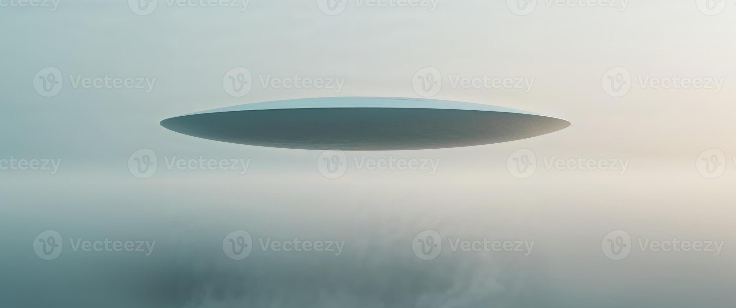 Mysterious disc shaped object over misty area. photo