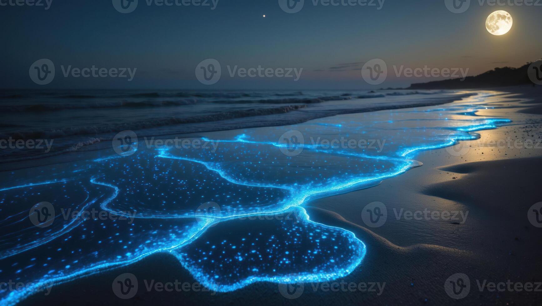 Glowing Waves on Beach at Night with Moon photo