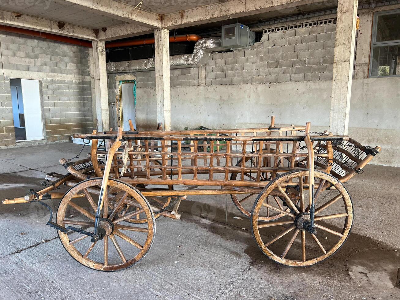 A Vintage Wooden Cart is found in an Abandoned Warehouse location photo