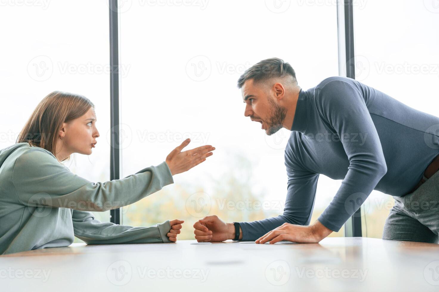 Man, is screaming at his girlfriend, conception of quarrel photo