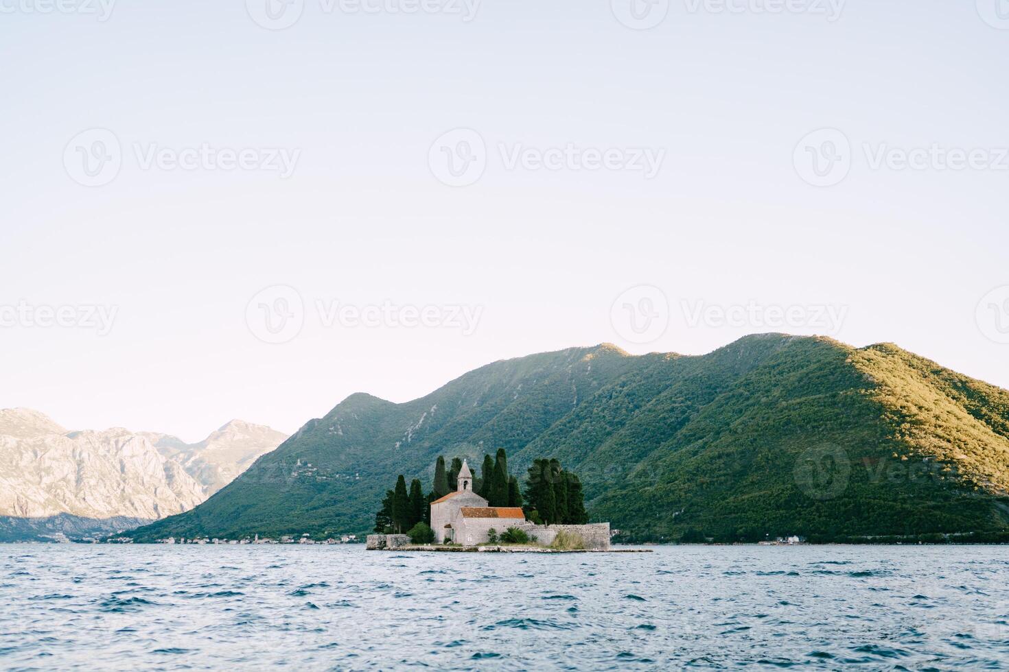 Island of St. George in the Bay of Kotor with mountains in the background. Montenegro photo
