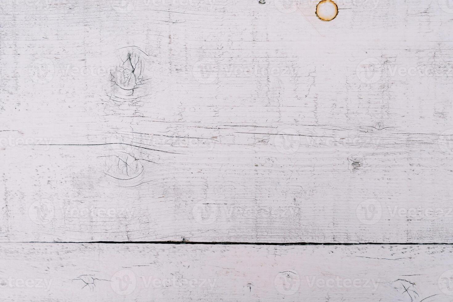White wooden background with scratches and rust spots photo
