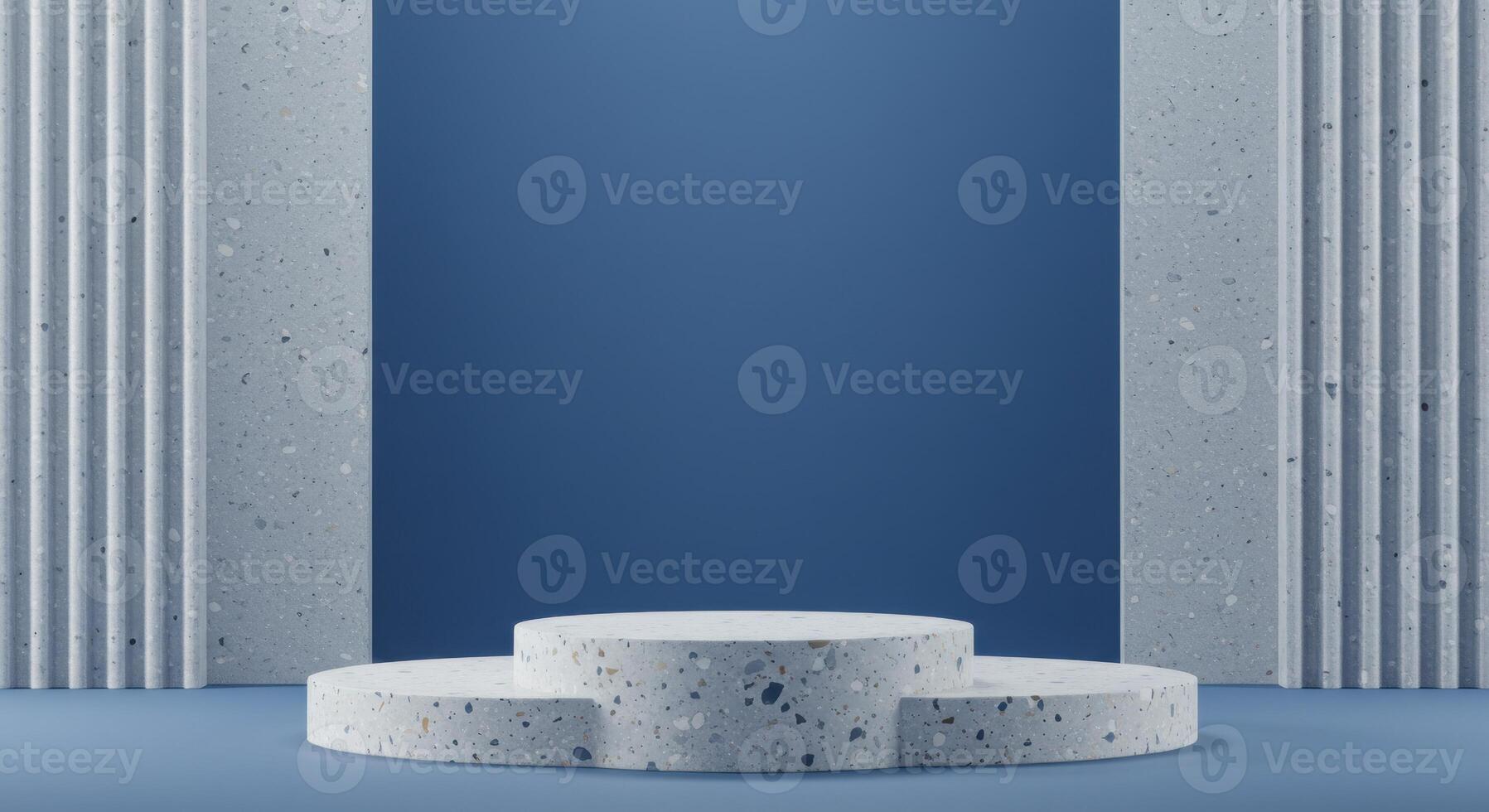 A three-tiered grey terrazzo podium stands against a solid blue backdrop framed by textured grey panels photo