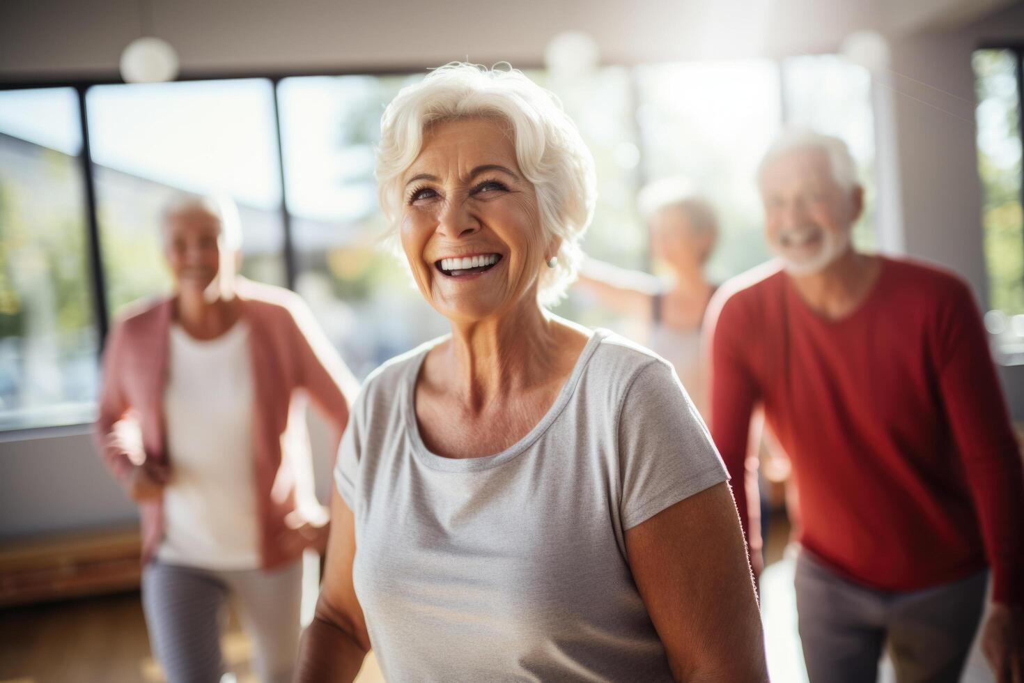 Elderly fitness enthusiasts staying vibrant as they exercise in the gym photo