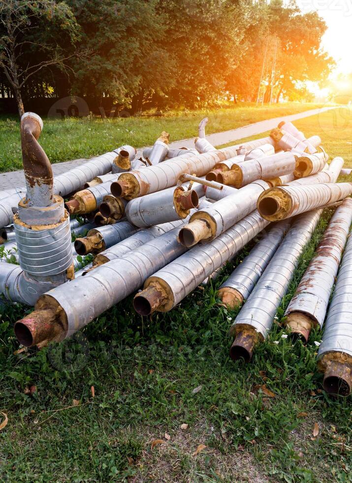 Rusty old industrial pipes photo