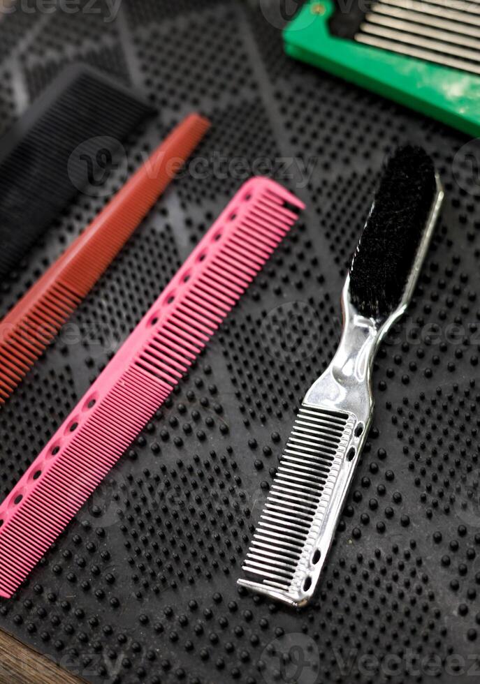 professional combs on table photo