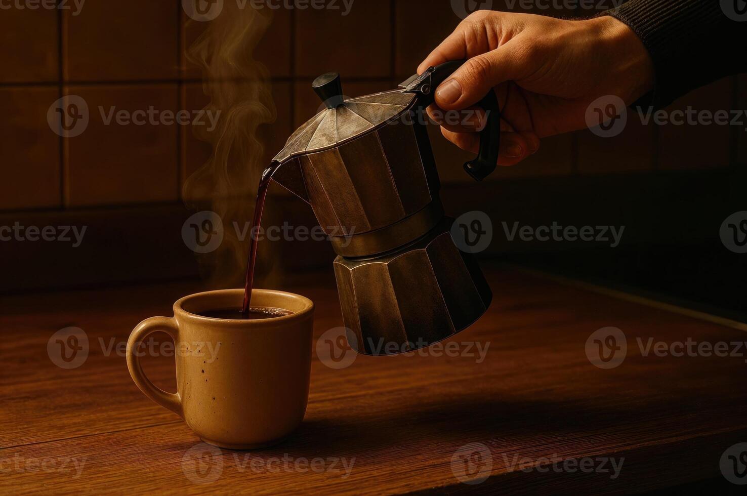 Pouring hot coffee from moka pot into ceramic mug on wooden countertop photo
