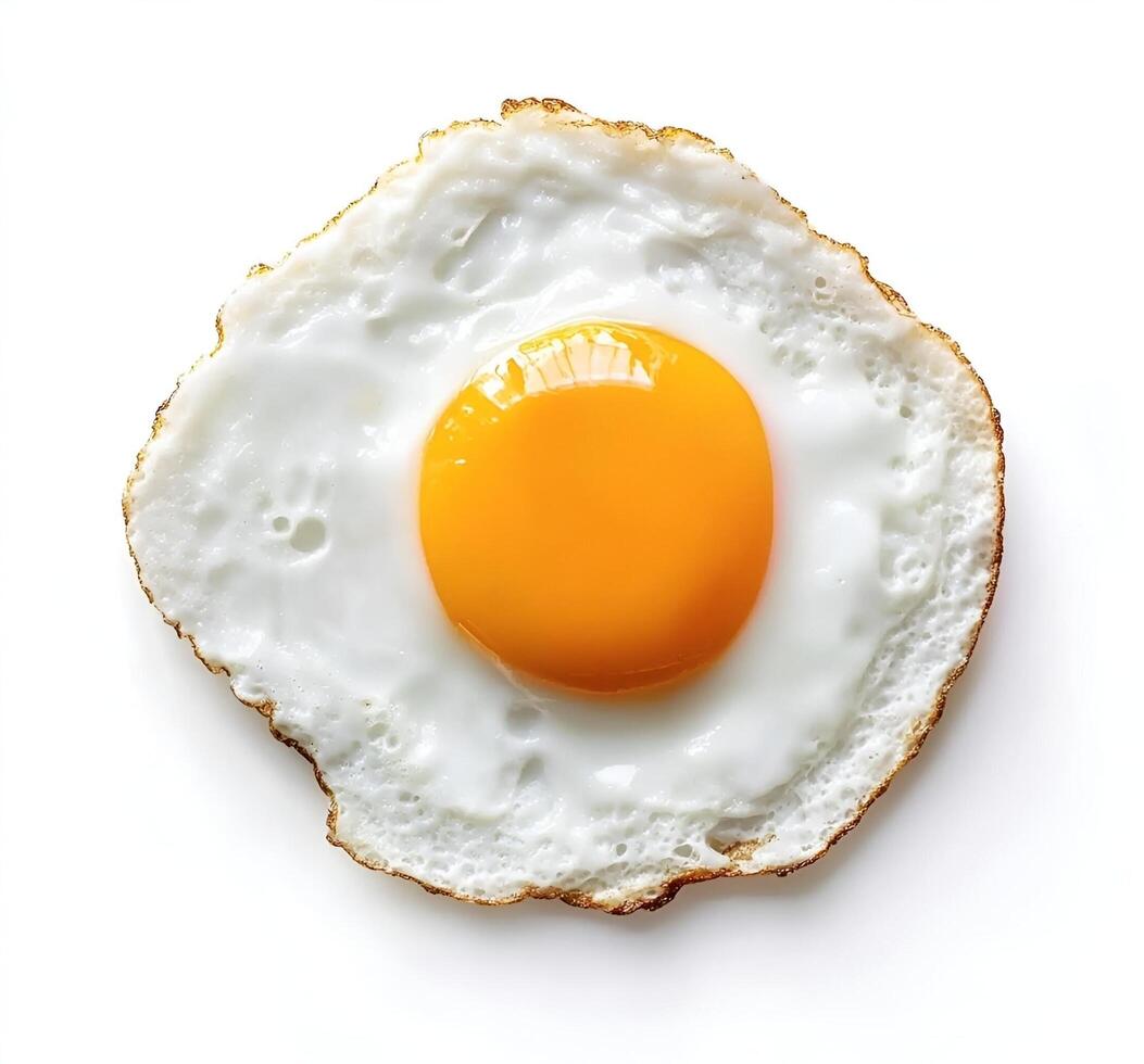 An egg is shown on a white surface photo