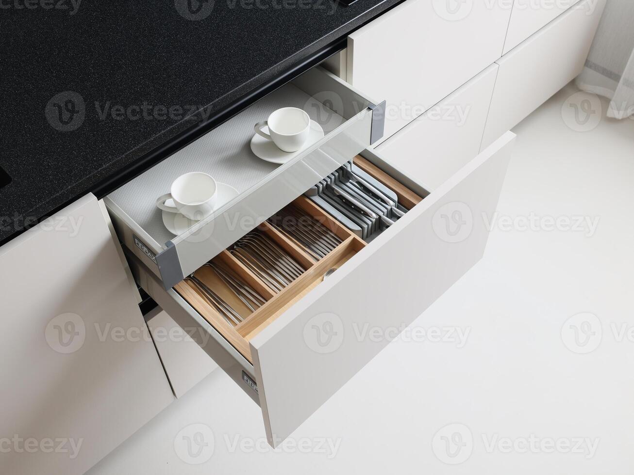 Enhancing your living space with modern kitchen drawer organizing systems for cutlery and cups photo