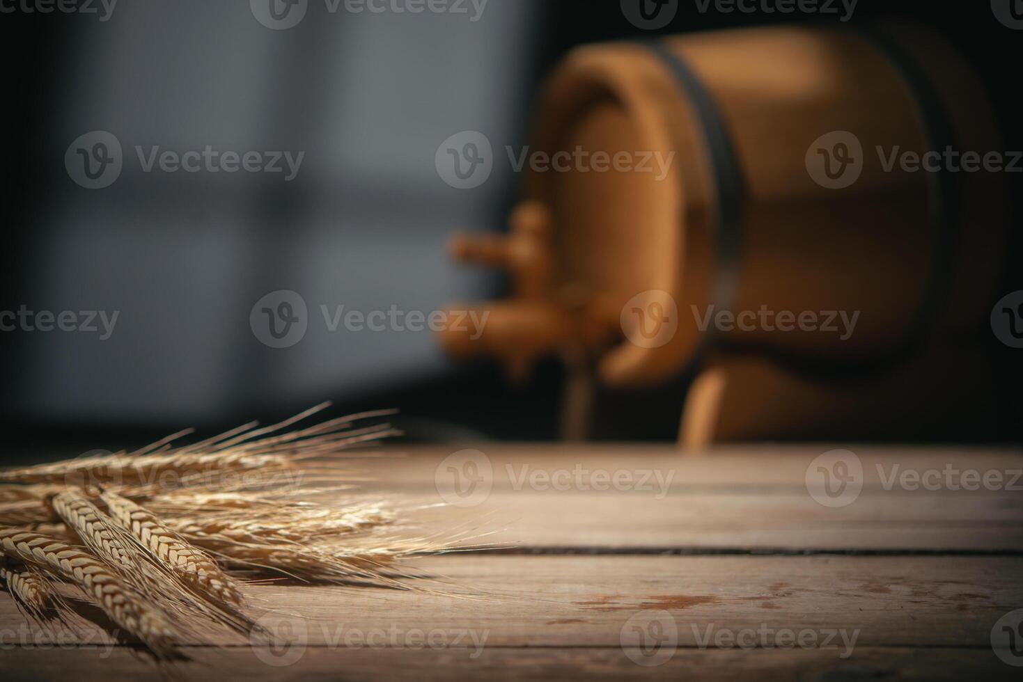 Background for beer presentation. Wheat and barrel in the cellar photo