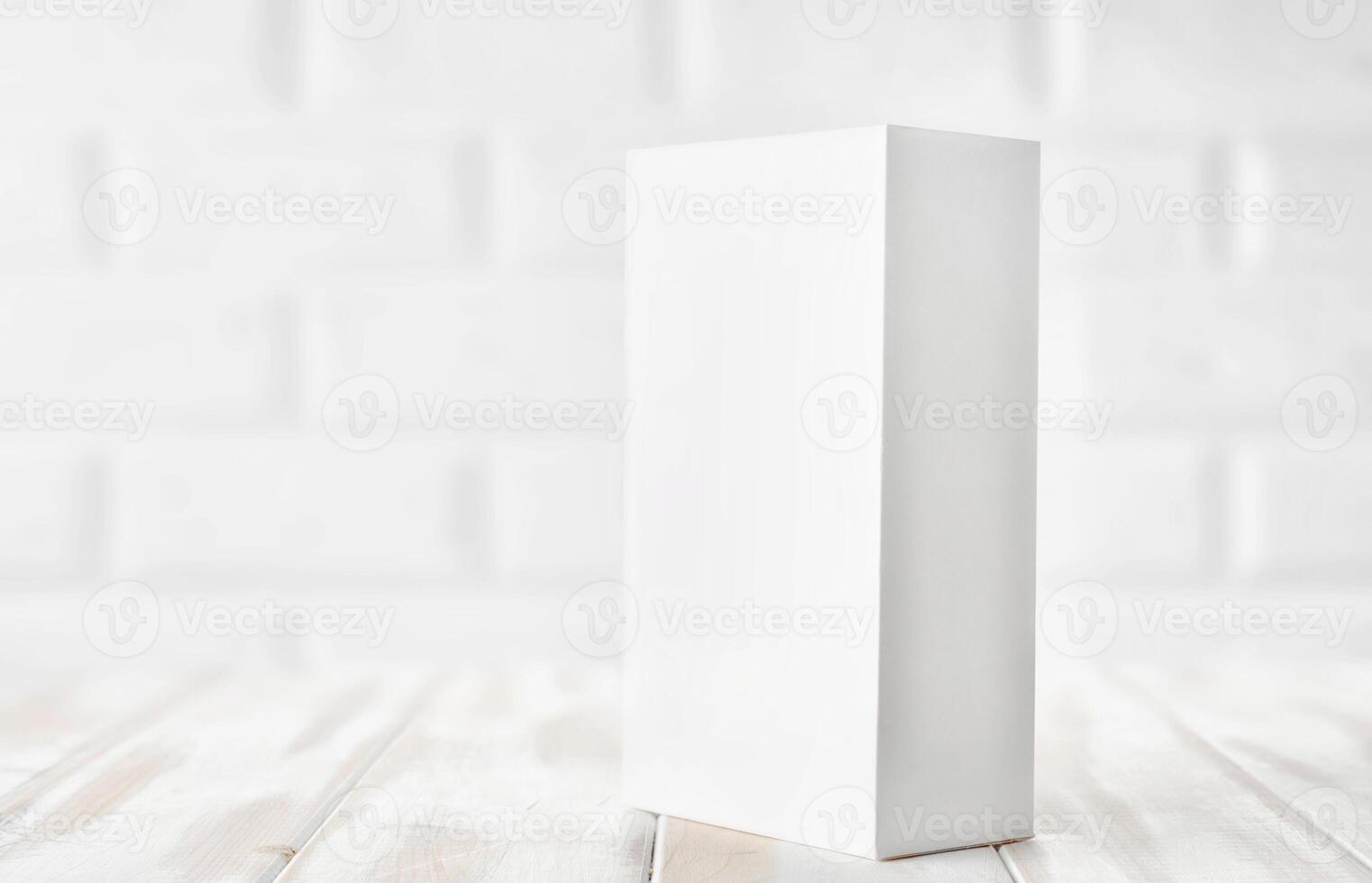 White packing box from a smartphone or other equipment on the table photo