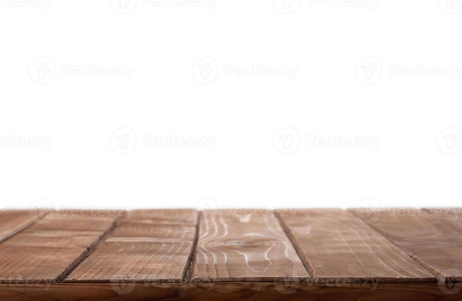 Wooden table top on isolated white background photo
