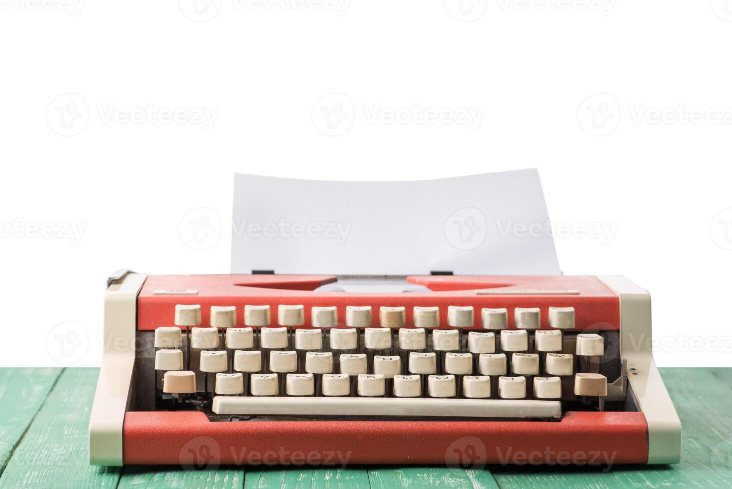 A typewriter on a table with an isolated background photo