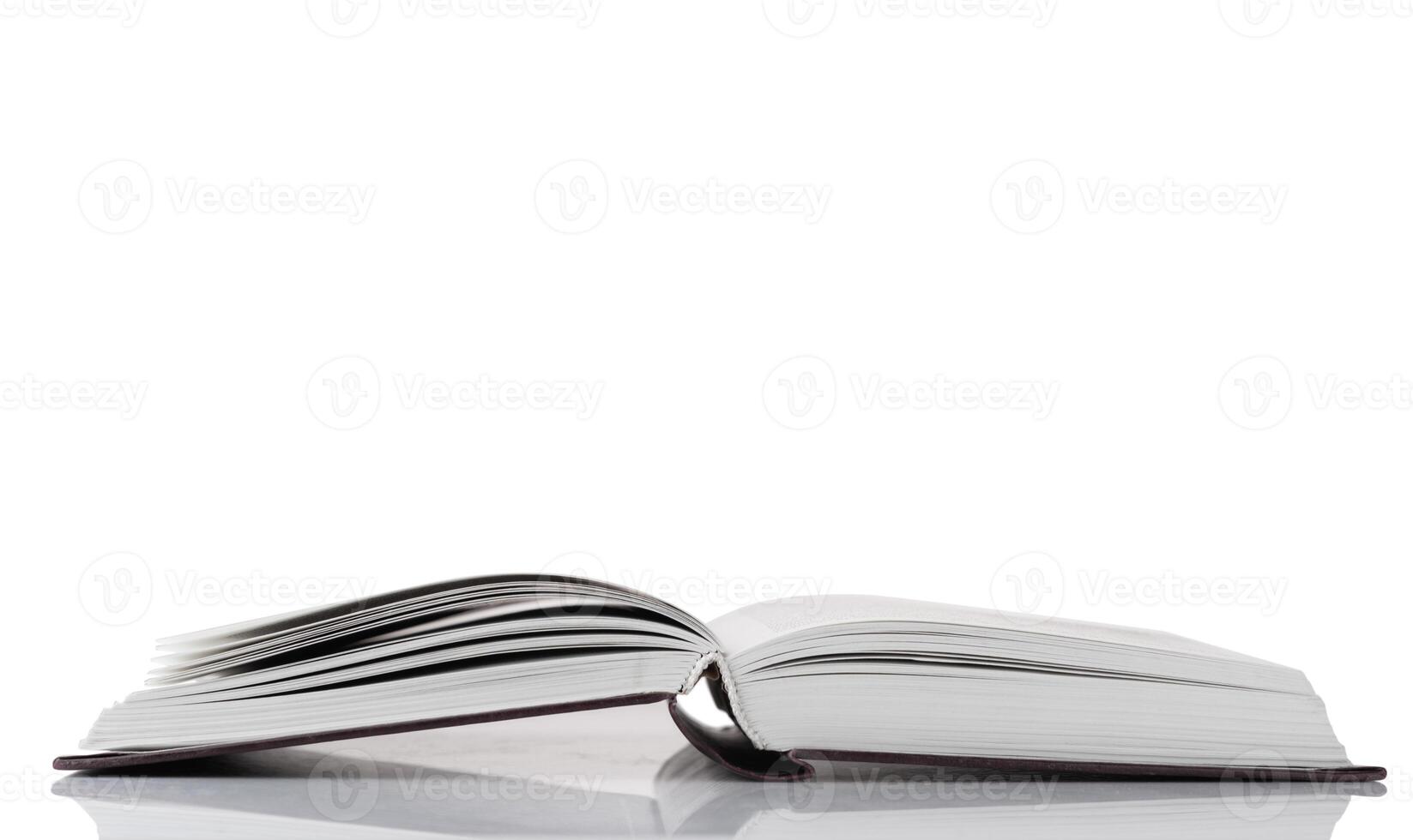 Open book on white background photo
