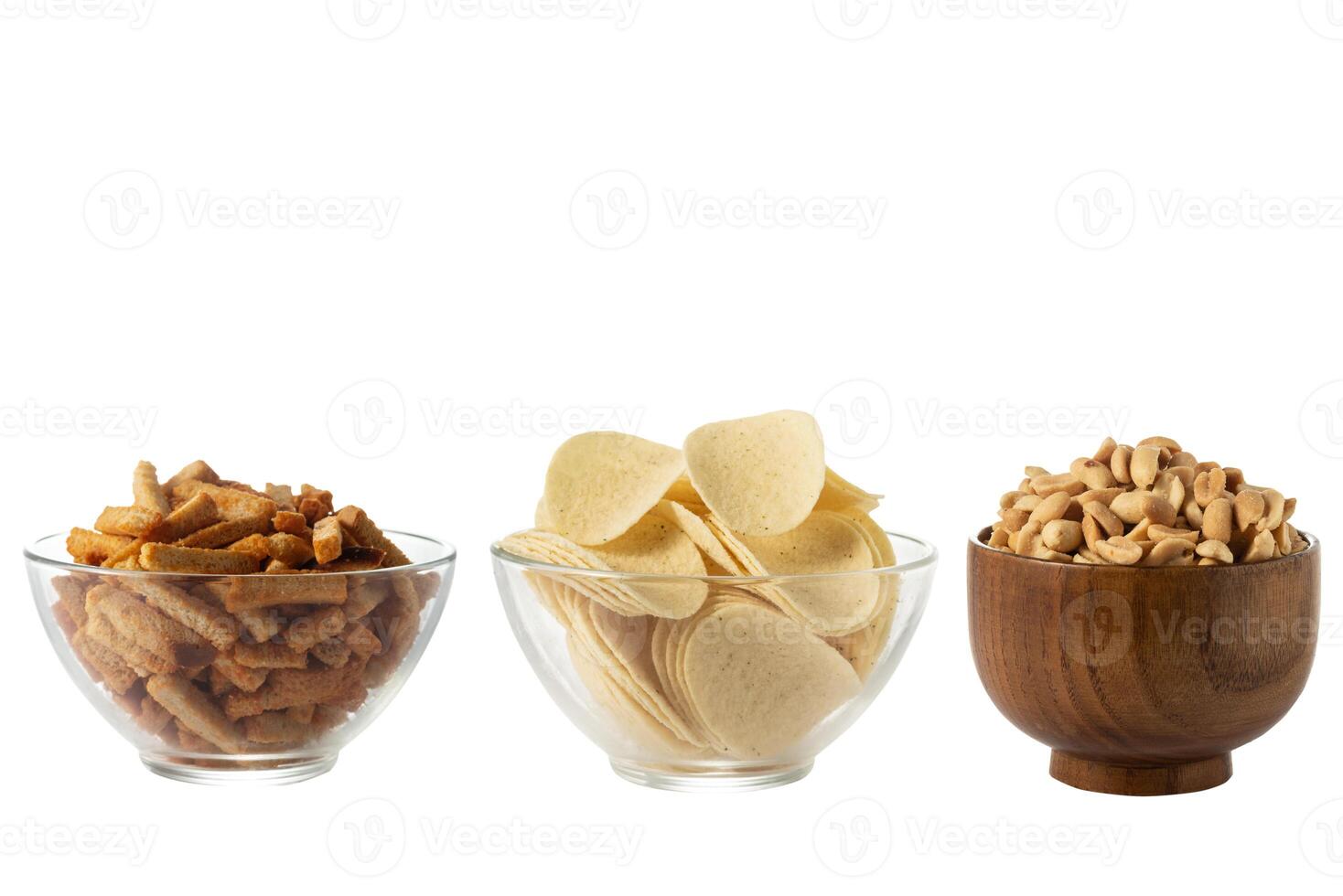 Set of beer snacks. bread crumbs, potato chips, salted peanut photo