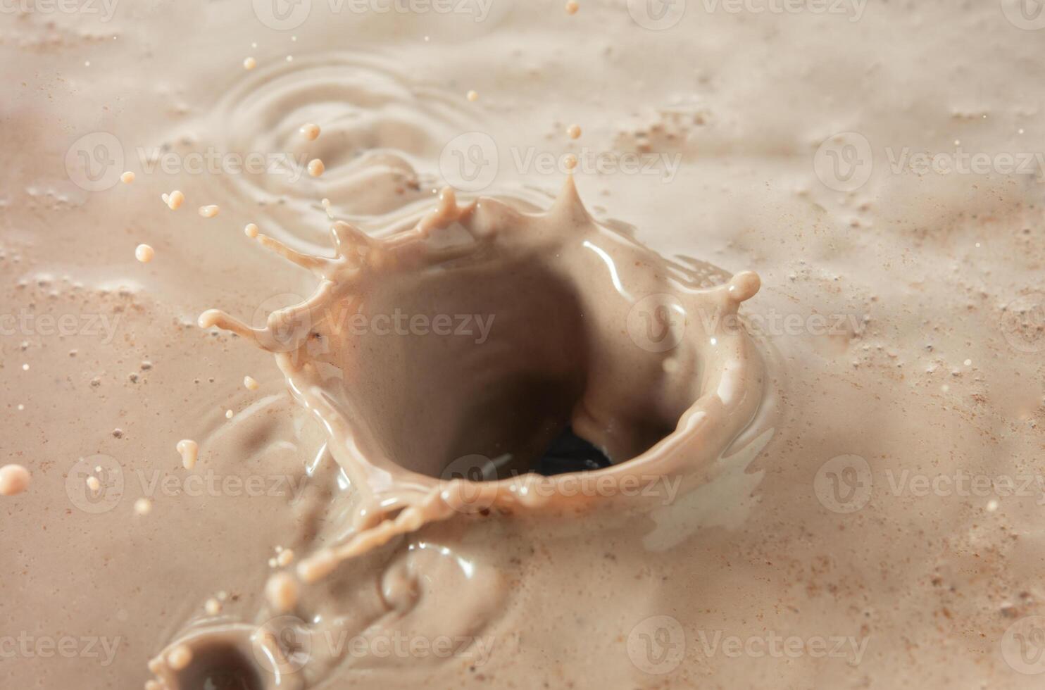 Splash of cocoa close up photo