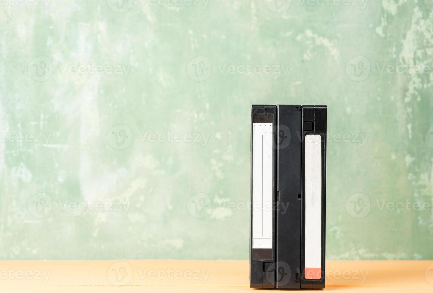 An old cassette sitting on top of a table photo