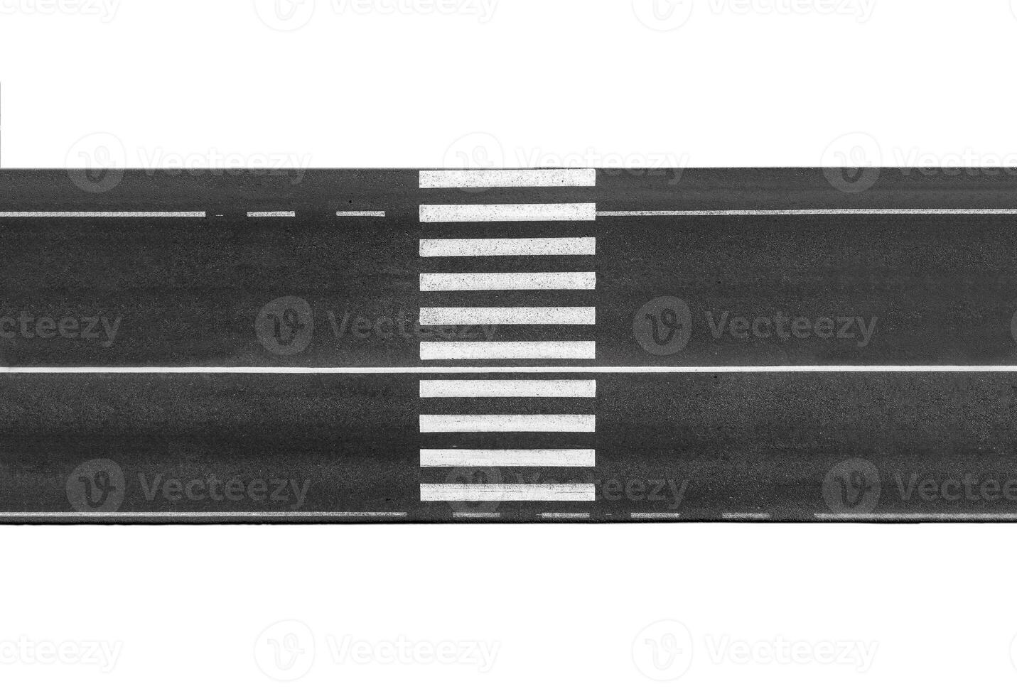A black and white photo of a road with white lines