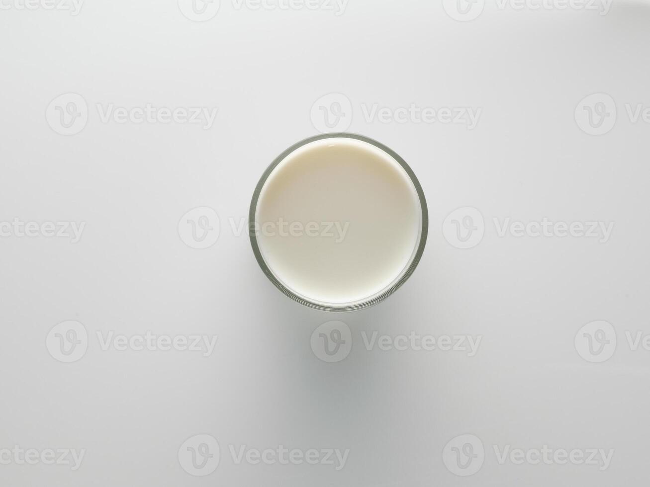 Glass of fresh milk - top view photo