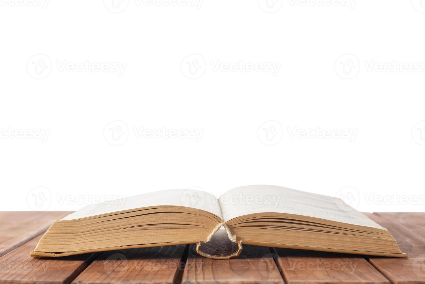 Open book on table with isolated background photo