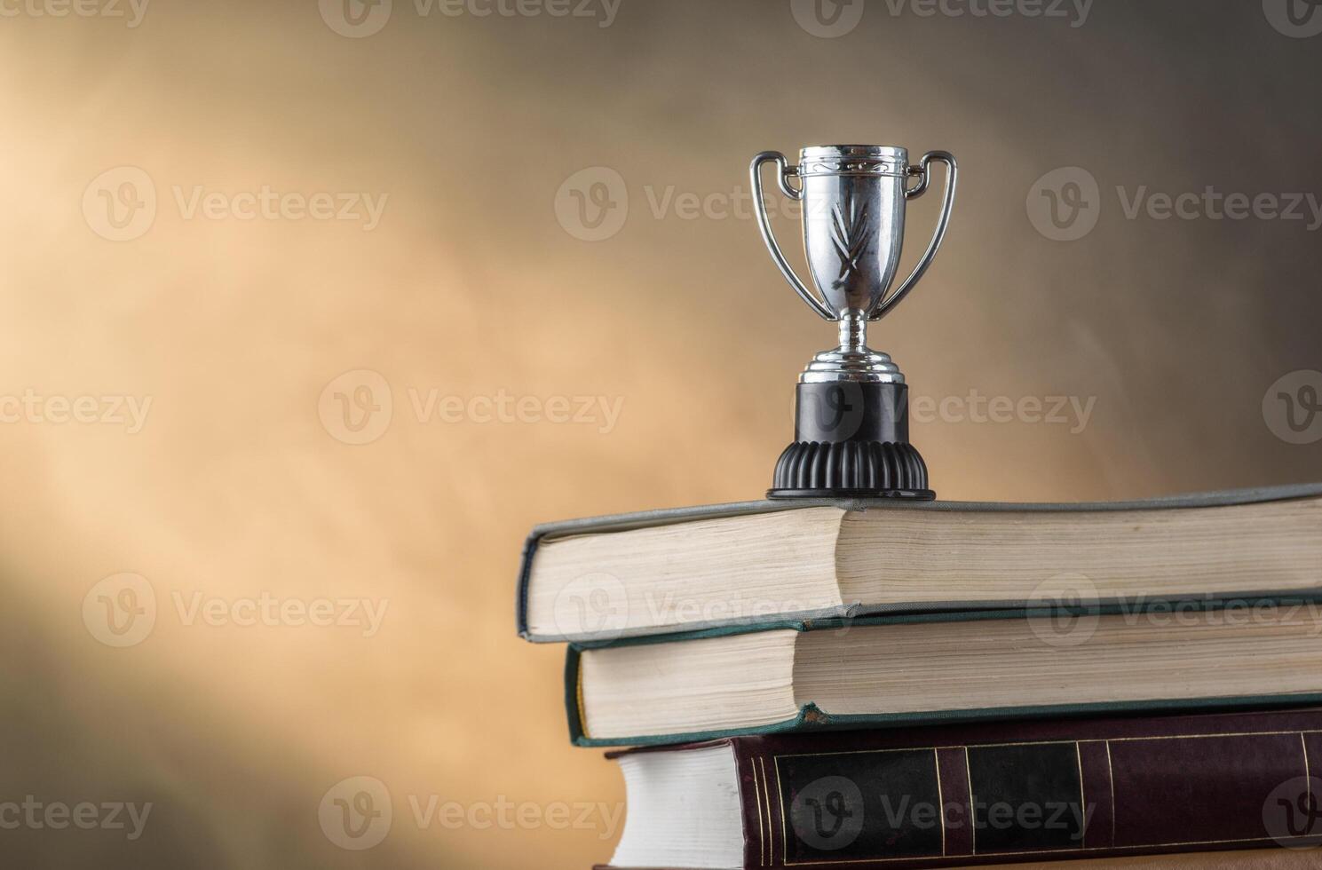 Books and sports cup photo