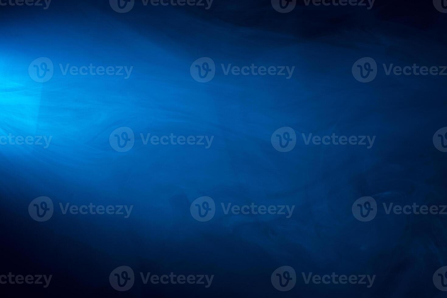 Blue light on a dark background photo
