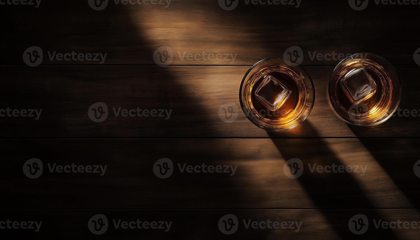 Top View Of Two Glasses Of Whiskey, Rum, Brandy, Or Bourbon With Ice Cube On Wooden Table In Dim Lighting. Alcohol, Spirits, Drinking Establishment Advertisement photo