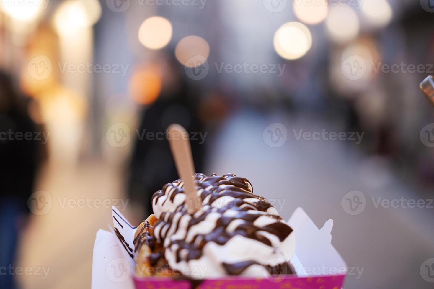 Close-Up of Belgian Waffle with Chocolate and Cream photo