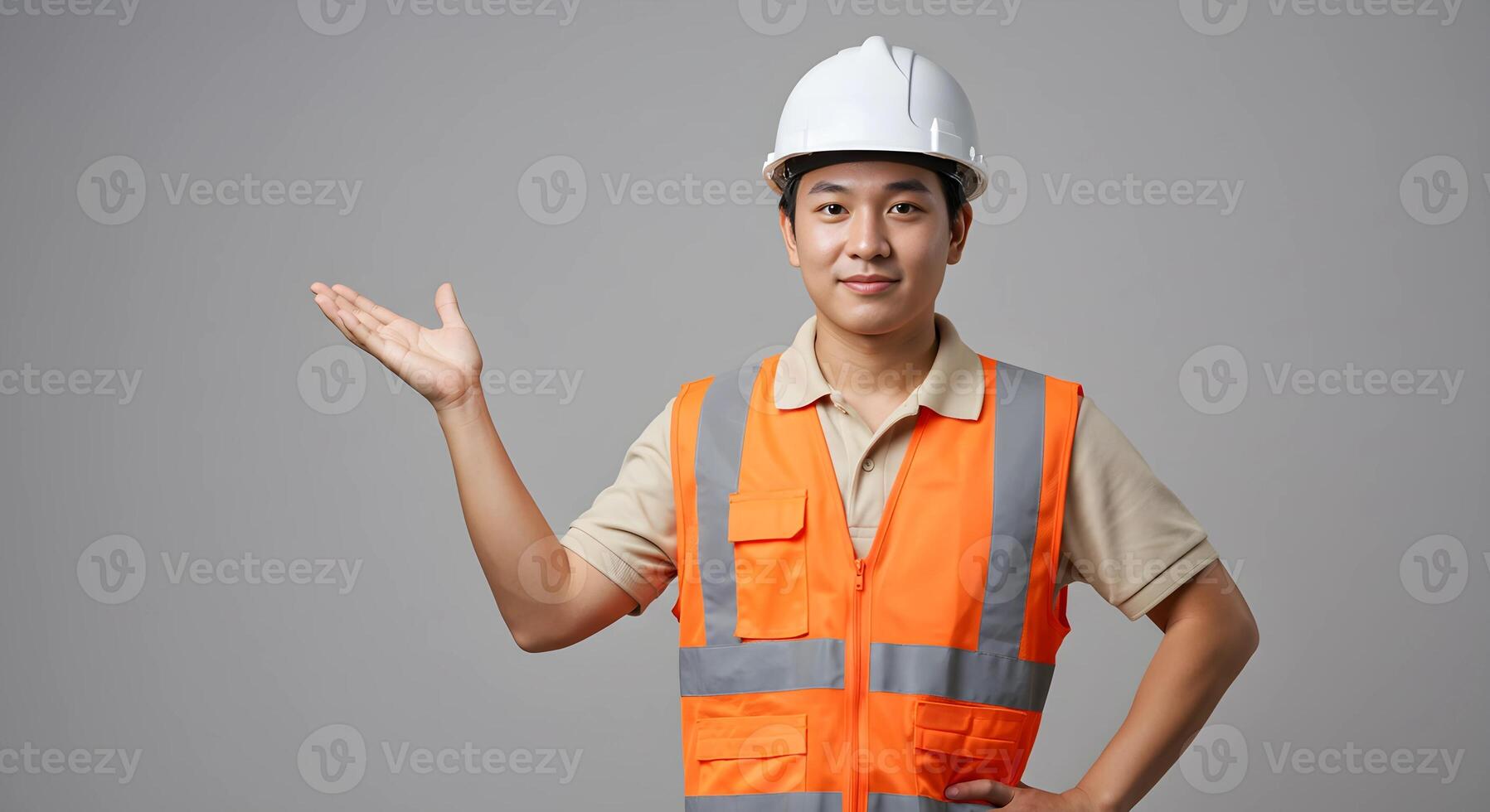 Construction Worker in Safety Gear Posing with Hand Gesture for Presentation 3 photo
