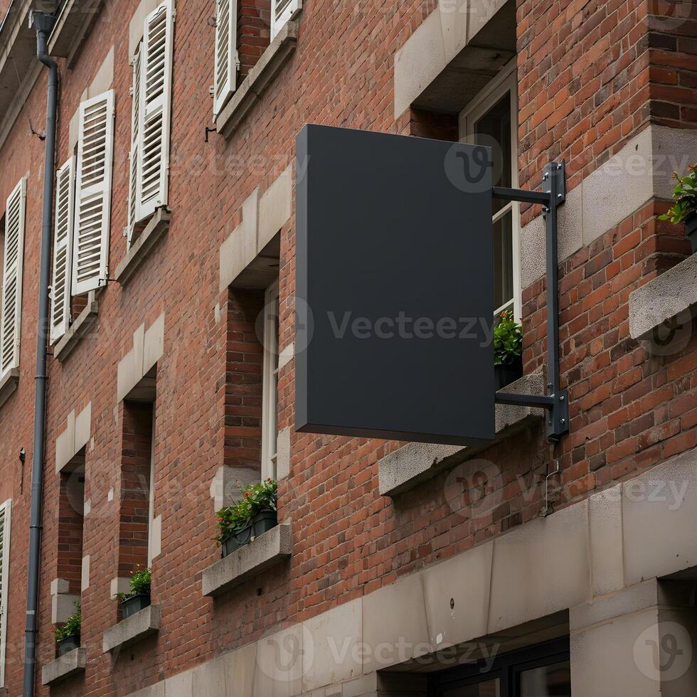 Blank Storefront Sign on Brick Wall in Urban Setting for Mockup 1 photo