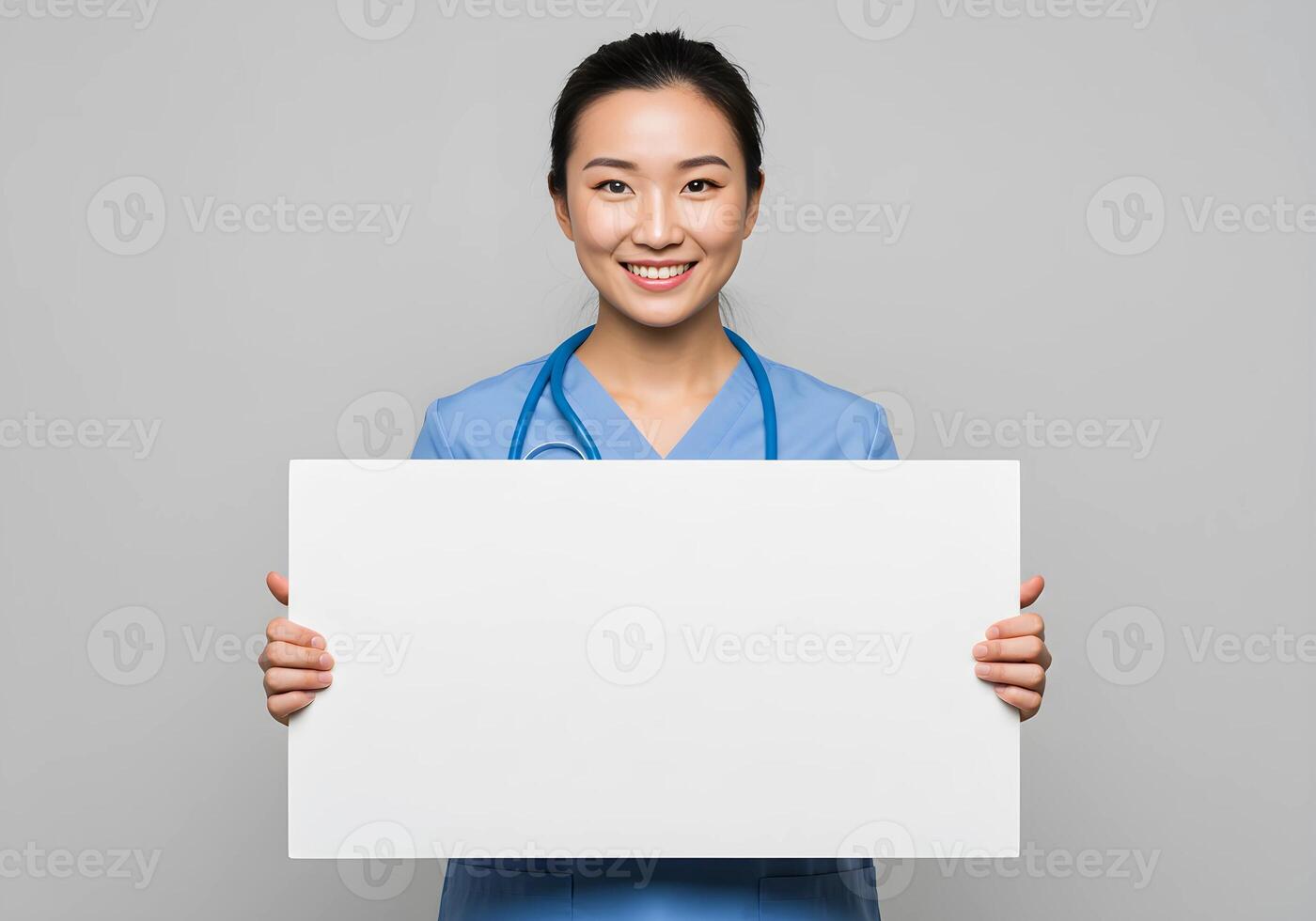 Professional Healtcare - Nurse Holding White Blank Sign for Mockup or Copy Space 2 photo