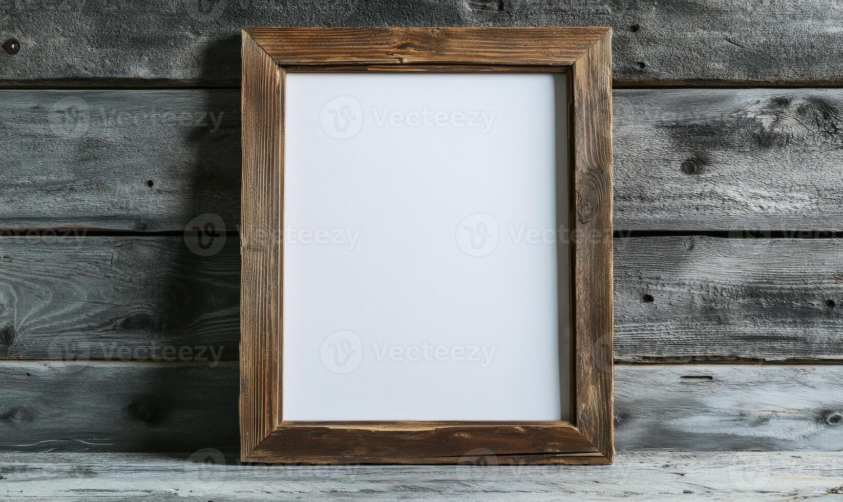 a blank white frame on a wooden wall photo