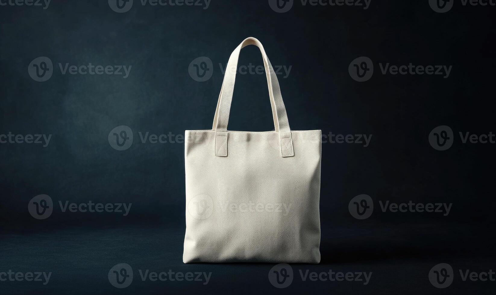A white canvas bag with a black background photo