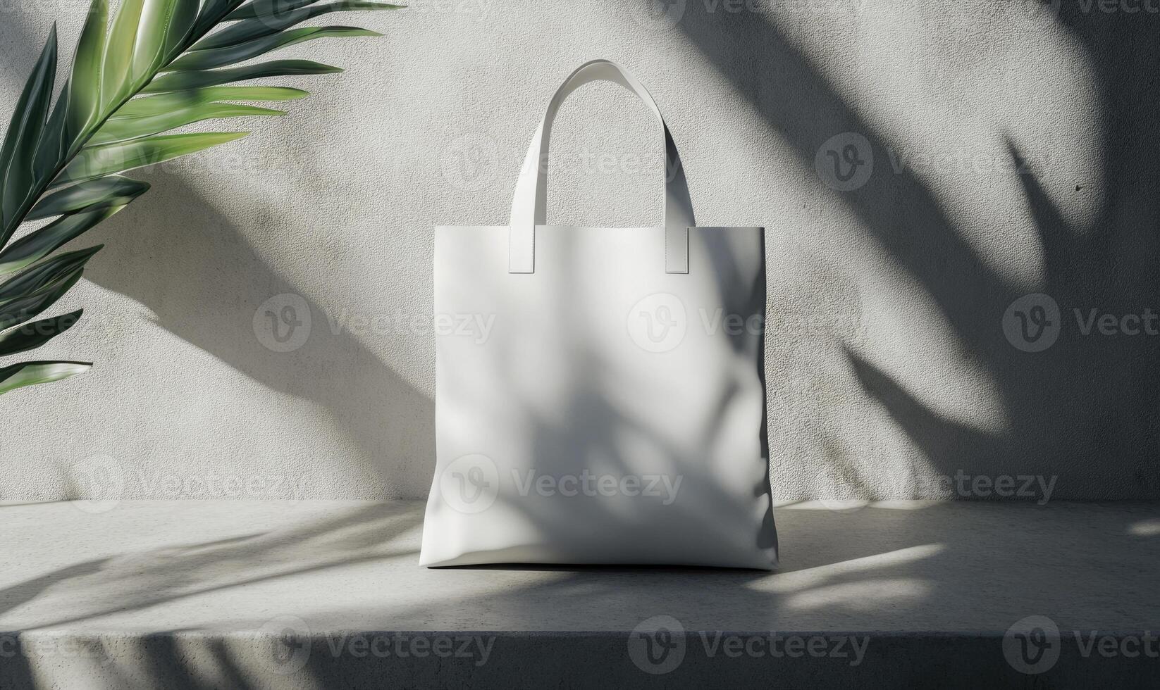 A white bag is sitting on a ledge in front of a plant photo