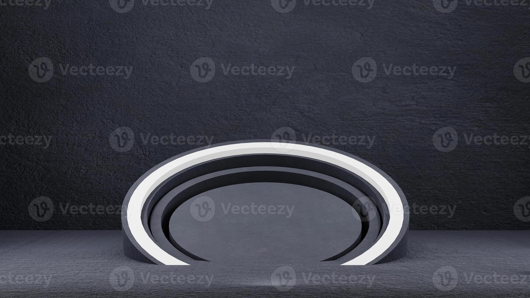 A circular light is sitting on a black surface photo