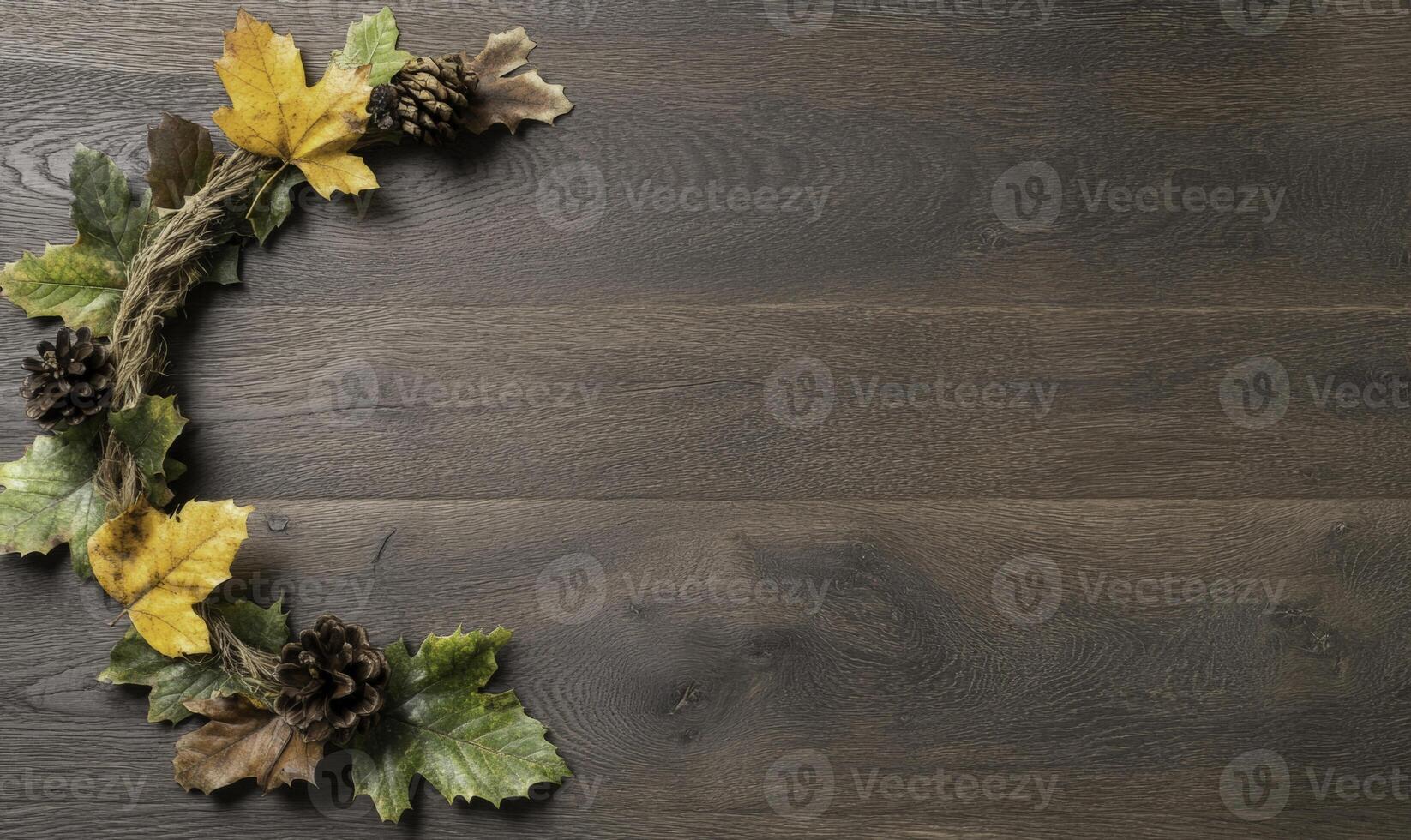 Autumn wreath on wooden background photo