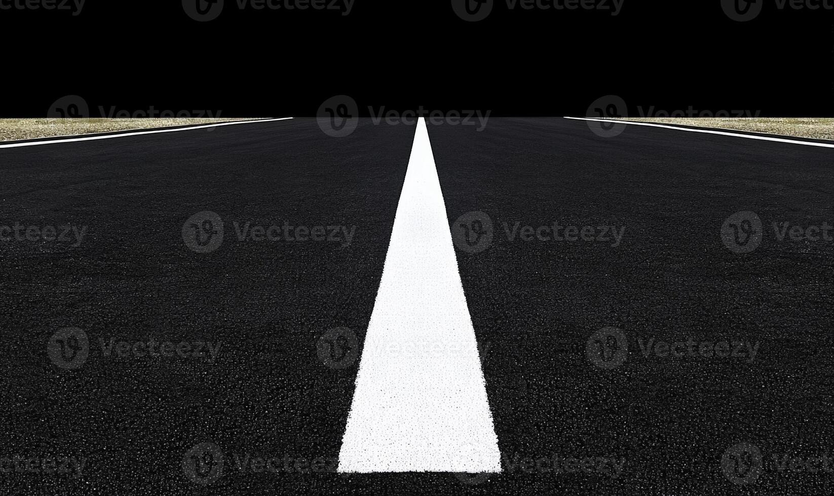 An empty road with white lines on it photo