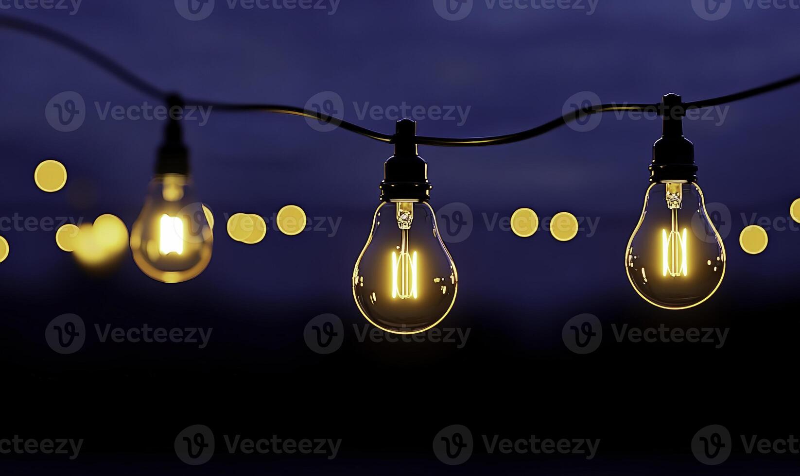 String lights with bulbs on a dark background photo