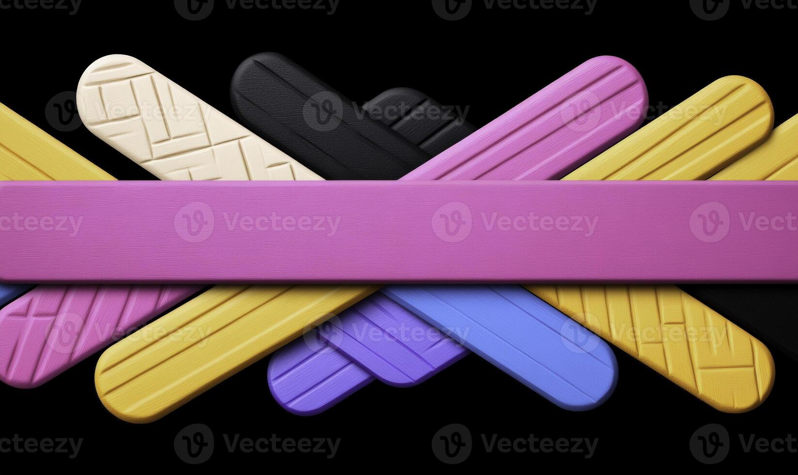 A group of colorful plastic sticks on a black background photo