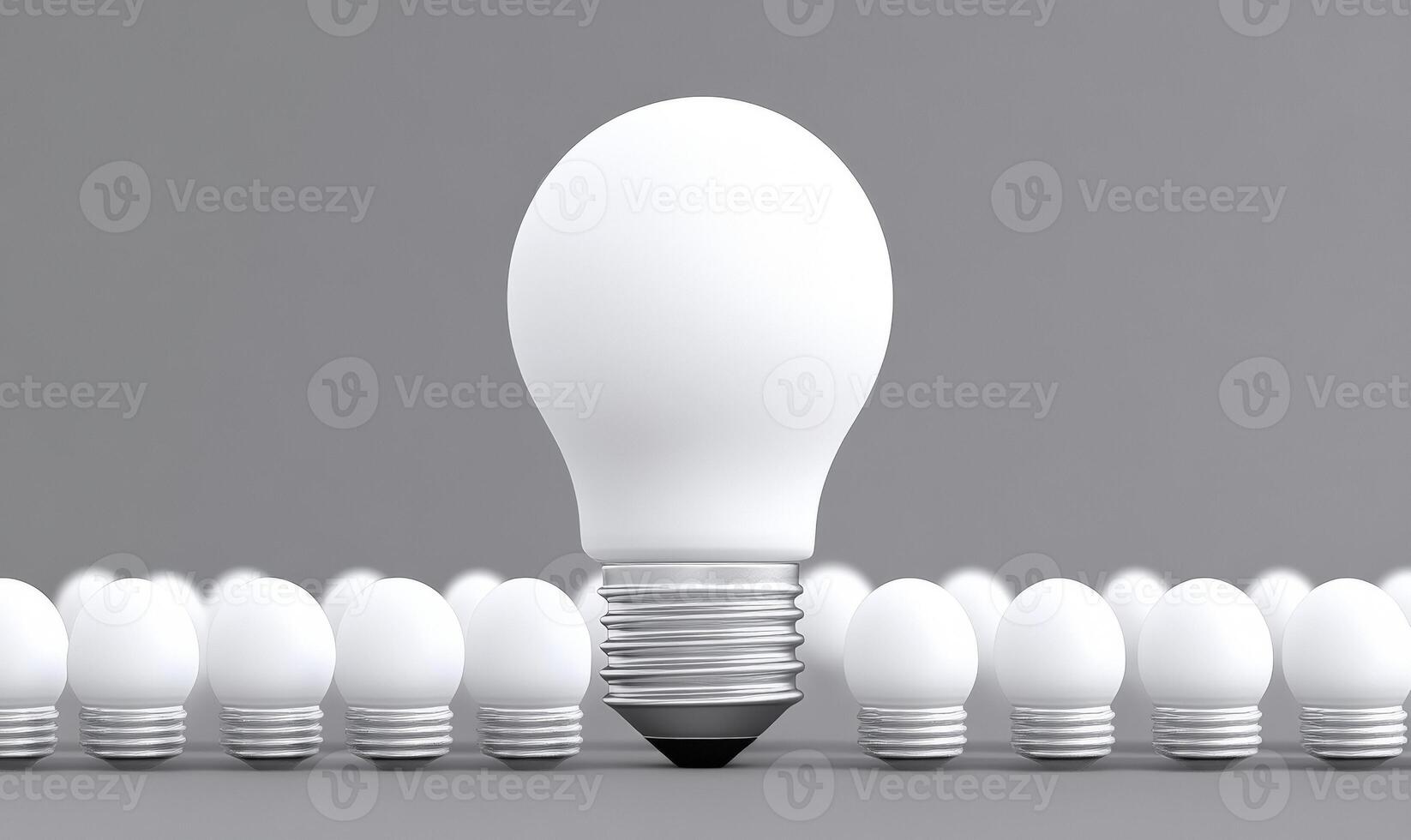 A light bulb is standing out from a group of white bulbs photo
